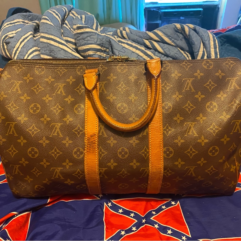 Louise Vuitton overnight bag
